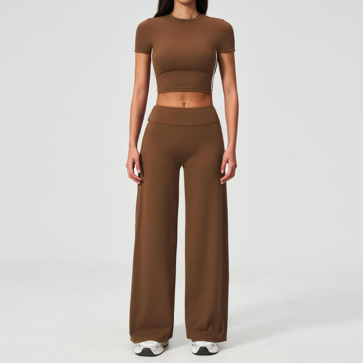 Wholesale Women's High-Waisted Flared Athletic Pants, High-Quality Short-Sleeve Fitness Top Sets, New Gym and Yoga Sets